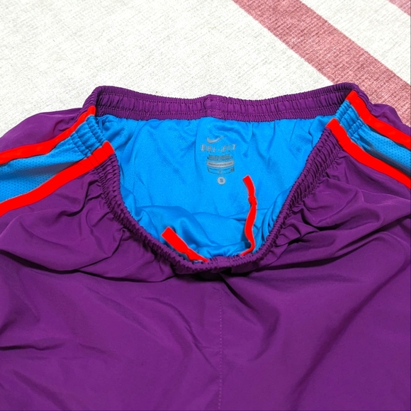 Small Neon Purple, Blue, and Coral Nike Running Shorts - Picture 3 of 3